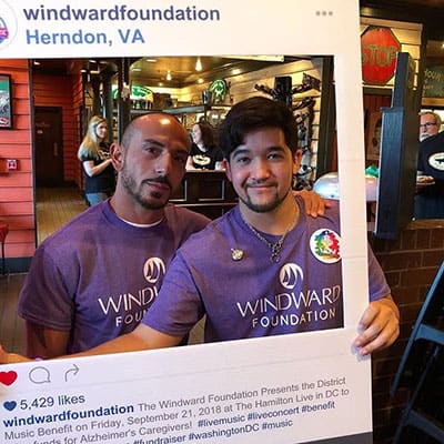 Windward Foundation holding up Instagram sign