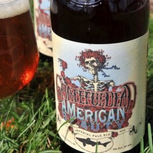 Picture of a bottle of American Beauty Beer.